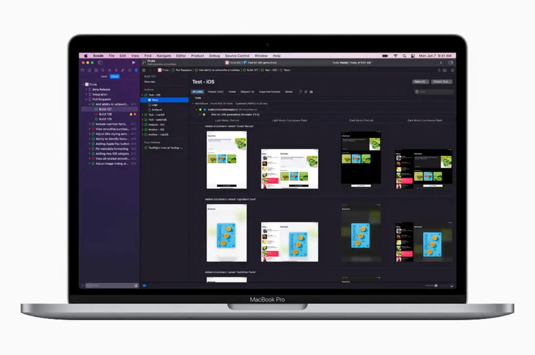 MacBook with Xcode dark mode on screen